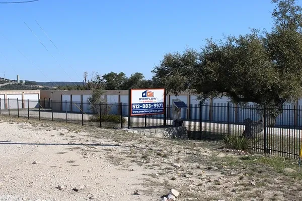 Drive up units, gate, and exterior sign at Overflow Garage